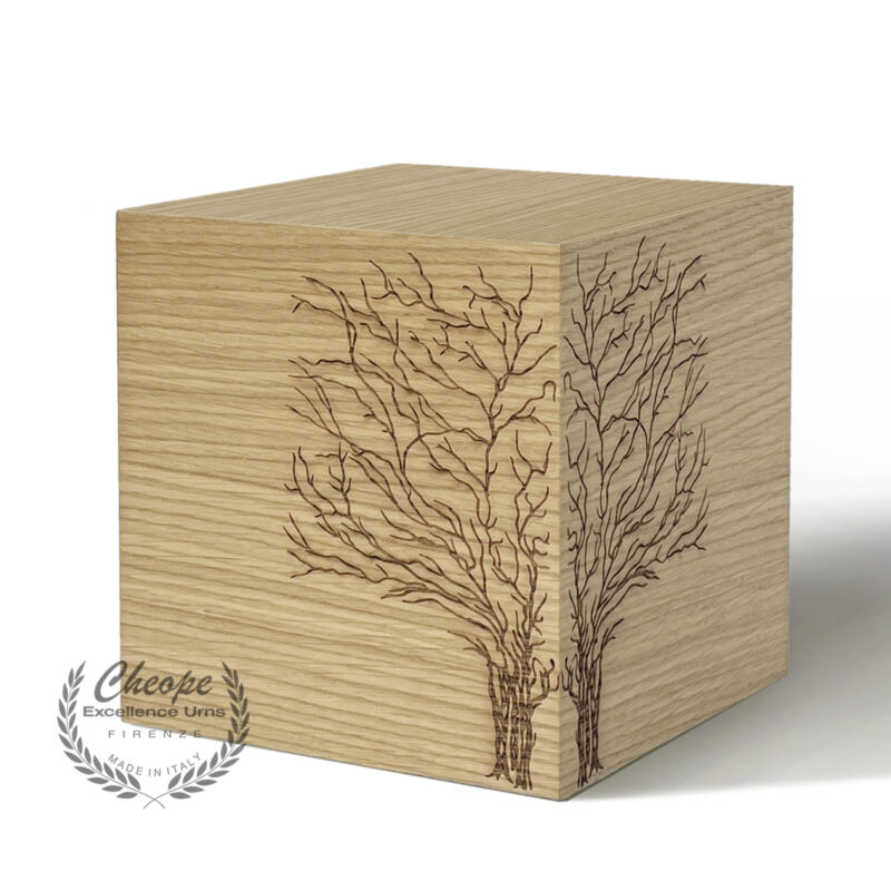 Urna cineraria Trees in legno di alta decorazione, per la custodia delle ceneri da cremazione, di grande versatilità di ambientazione per onorare la memoria del proprio caro in modo elegante e per tenerlo sempre insieme a noi in un contesto di armonia e discrezione